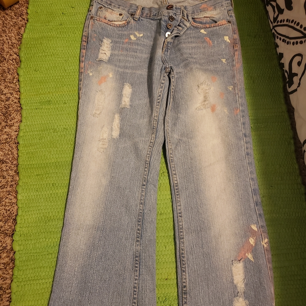 Jeans designed with paint stains